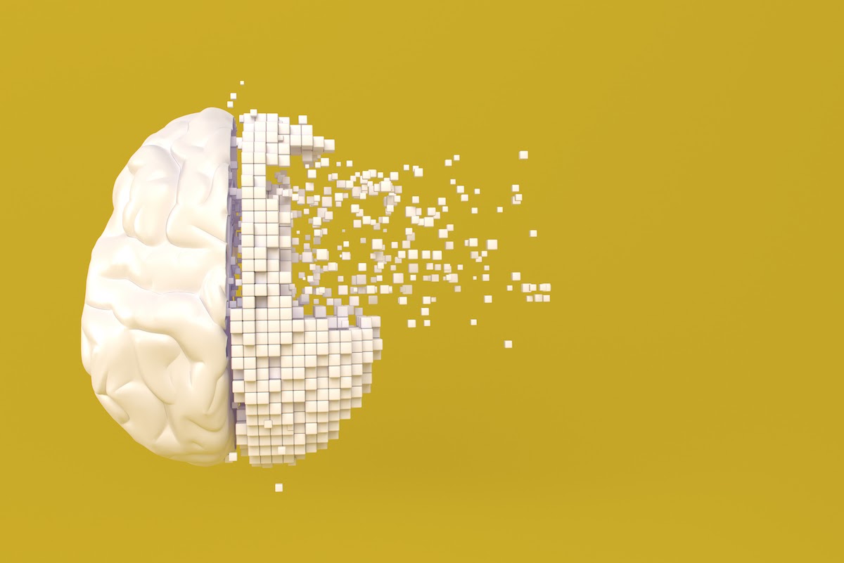A graphic image of a human brain breaking off into tiny cubes.