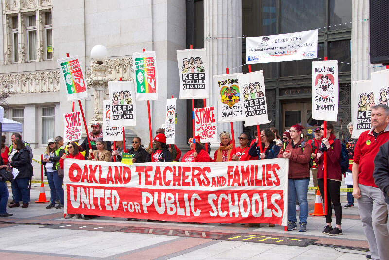 A group of people in a manifestation for education